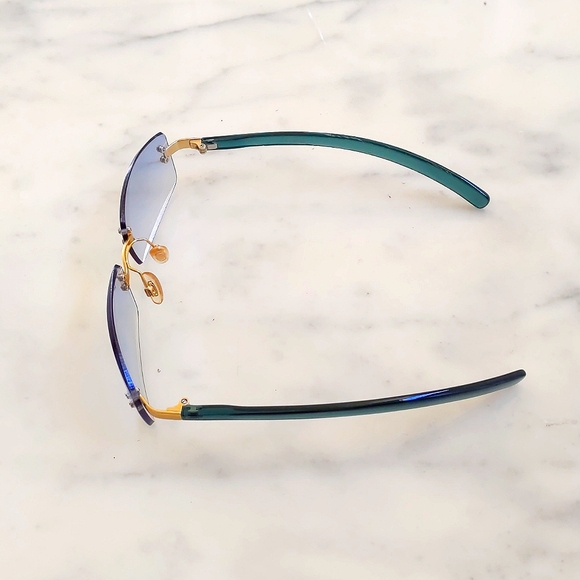 NWOT. The Limited Multi Shades of Blue Frameless Sunglass. - Picture 2 of 3
